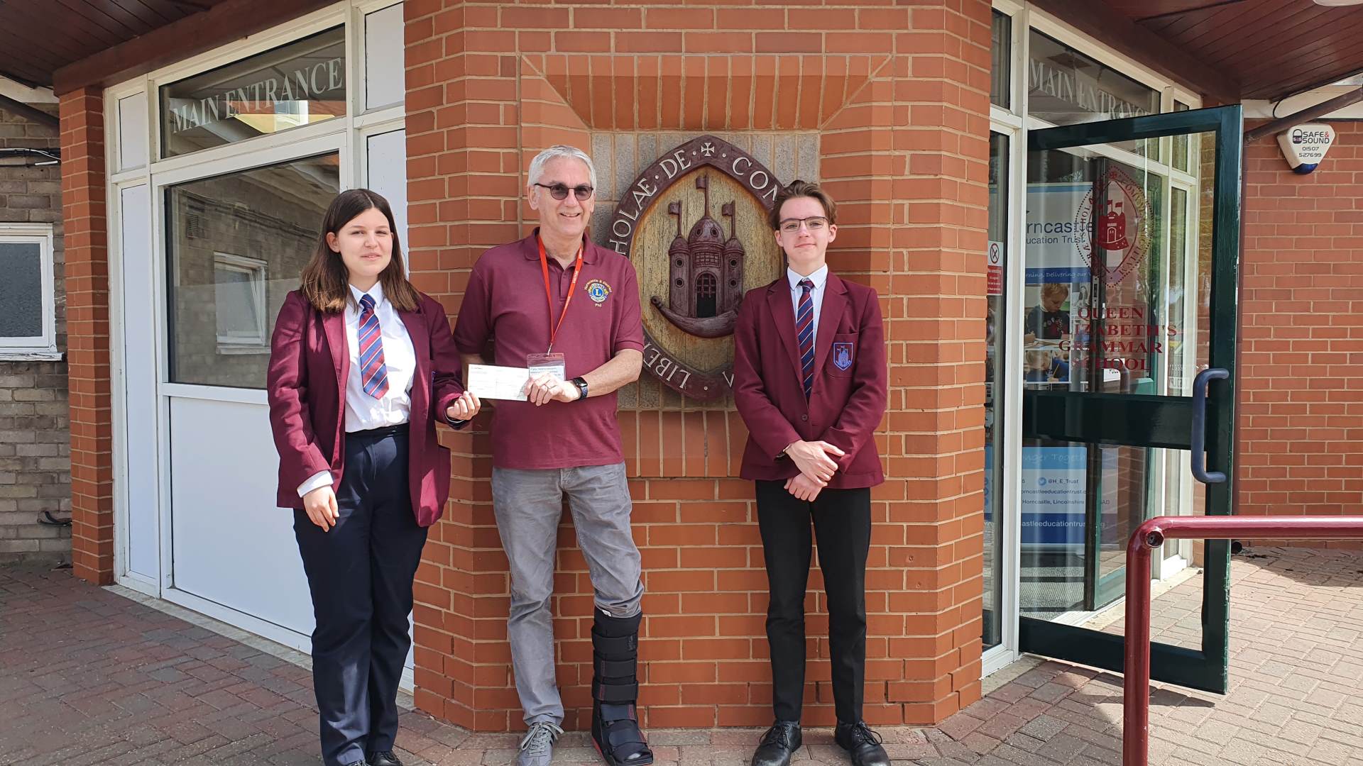 Phil, with Student Council representatives Isabelle Sharman and Kai Chance.